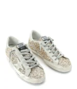 Golden Goose Women's Superstar Glitter Low Top Sneakers in gold - Image 4